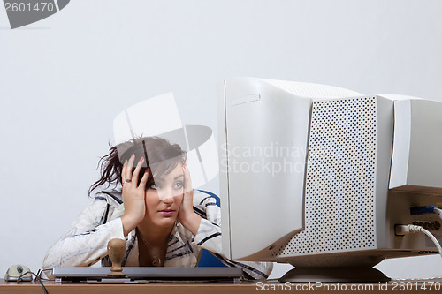 Image of Young female office worker