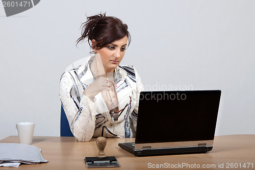 Image of Young female office worker