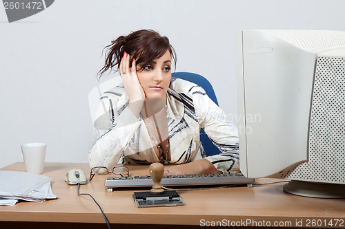 Image of Young female office worker