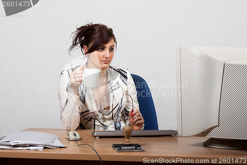 Image of Young female office worker