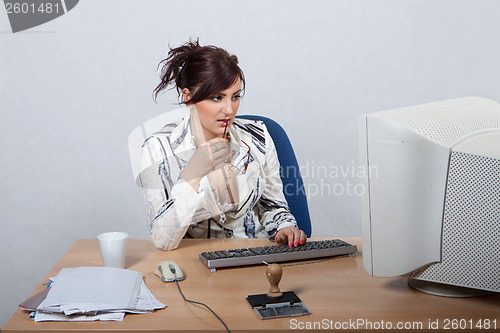 Image of Young female office worker