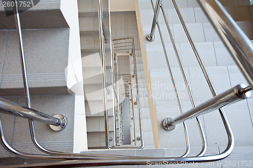 Image of staircase with metal railing
