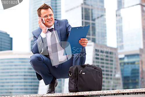 Image of businessman talking on the phone