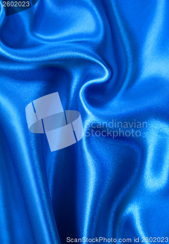 Image of Smooth elegant blue silk as background 