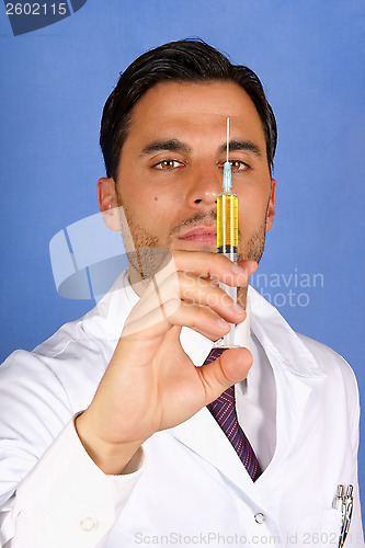 Image of Doctor holding syringe