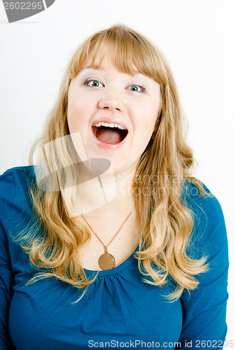 Image of portrait of a young woman screaming