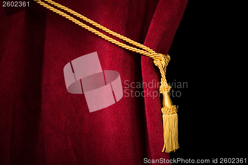 Image of Red velvet curtain with tassel