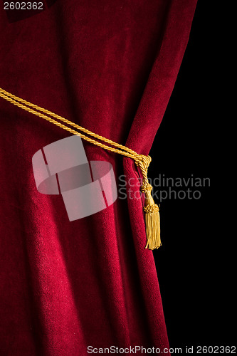 Image of Red velvet curtain with tassel