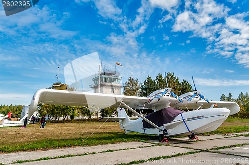 Image of Small airplane in little airport