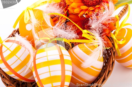 Image of Colourful yellow decorated Easter eggs