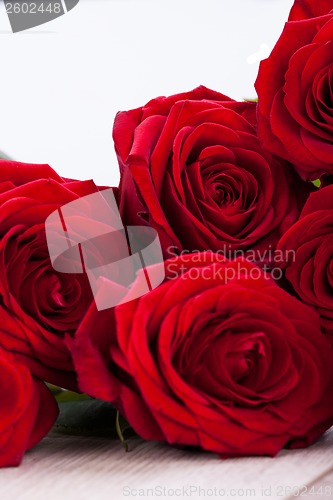 Image of beautiful red rose flower on black background