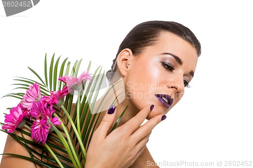 Image of Beautiful woman in purple make-up