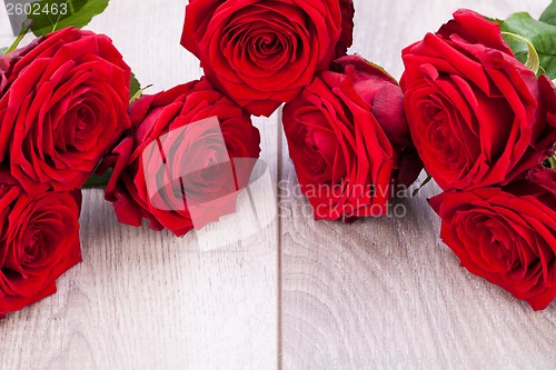 Image of beautiful red rose flower on black background