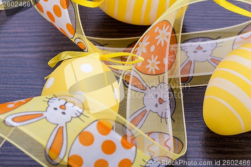 Image of Decorative Easter eggs, on a rustic wooden table