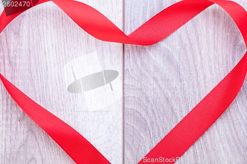 Image of Bouquet of red roses with ribbon border