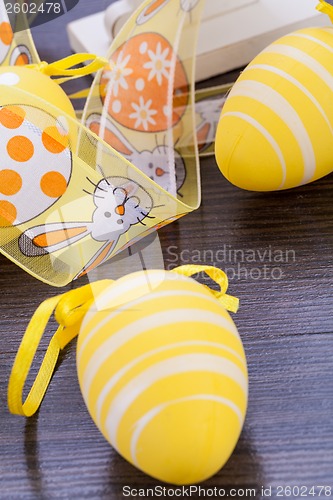 Image of Decorative Easter eggs, on a rustic wooden table