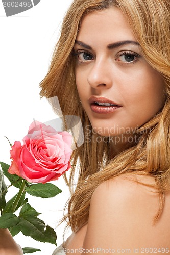 Image of attractive young smiling woman with flowers roses isolated