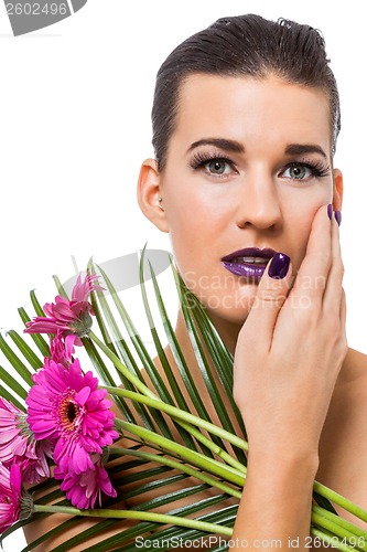 Image of Beautiful woman in purple make-up