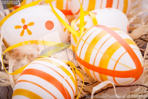 Image of Decorative Easter eggs, on a rustic wooden table