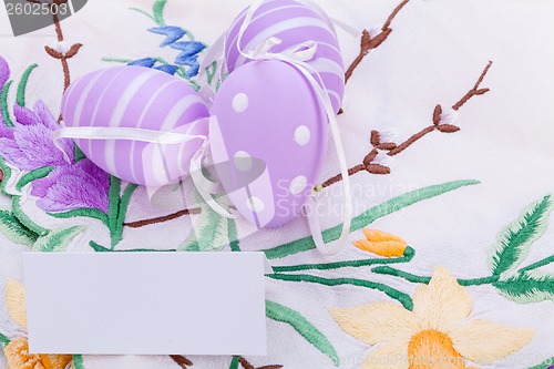 Image of colorful easter egg decoration on wooden background