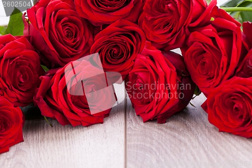 Image of beautiful red rose flower on black background