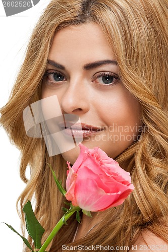 Image of attractive young smiling woman with flowers roses isolated