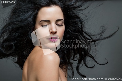 Image of Beautiful woman with a gentle serene expression