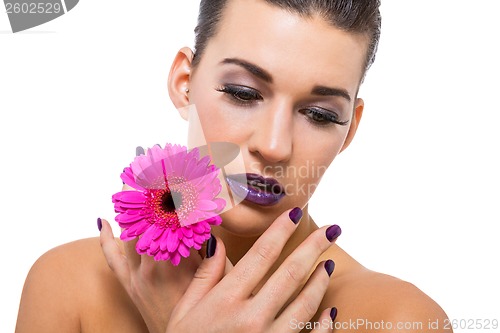 Image of Beautiful woman in purple make-up