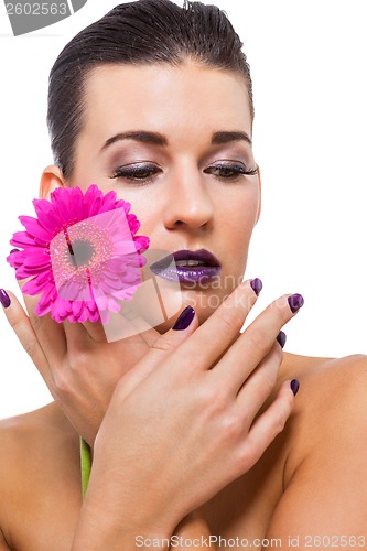 Image of Beautiful woman in purple make-up