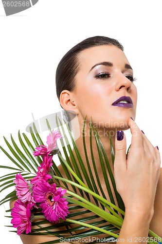 Image of Beautiful woman in purple make-up