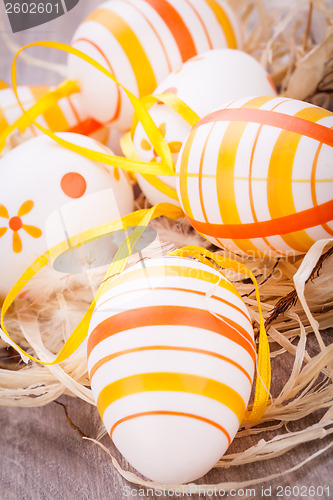 Image of Decorative Easter eggs, on a rustic wooden table