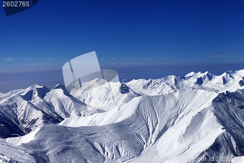 Image of View on off-piste slopes and multicolor blue sky at nice sunny d