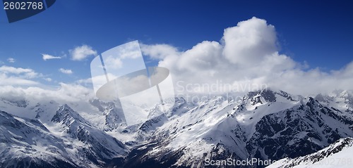 Image of Panorama of Caucasus Mountains in sunny clouds