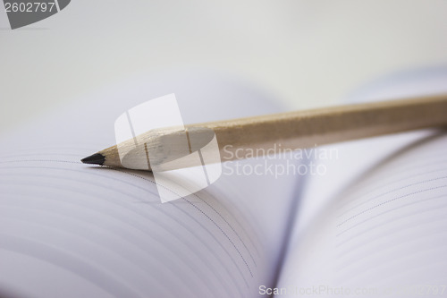 Image of Pencil on a book