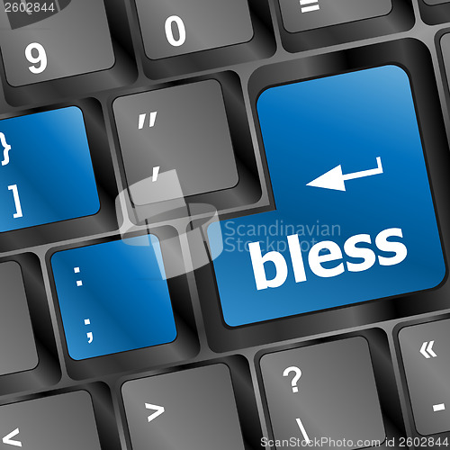 Image of bless text on computer keyboard key - business concept