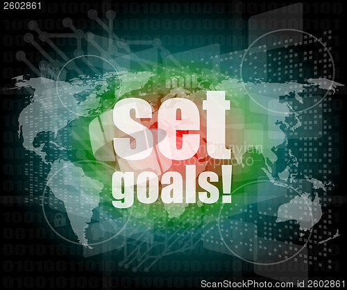 Image of business concept: words set goals on digital touch screen