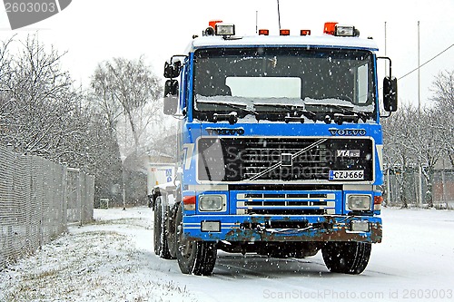 Image of Blue Volvo F16 Truck in Snowfall