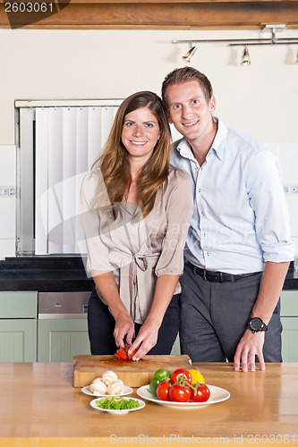 Image of Business couple in kitchen