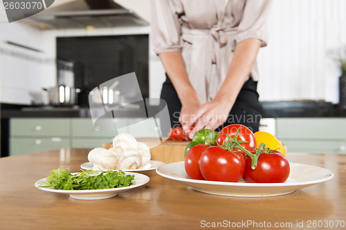 Image of Cutting fresh ingredients