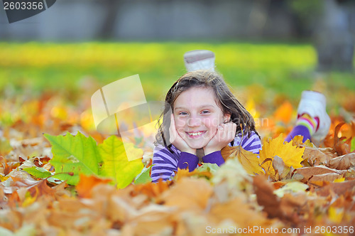 Image of little girl on autumn