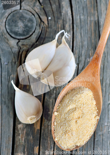 Image of garlic cloves, bulb and powder 
