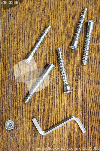 Image of Screws for assembling furniture and simple tool