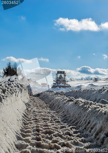 Image of truck cleaning road in winter