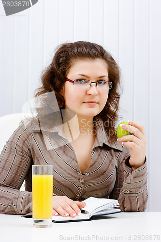 Image of Young woman in office