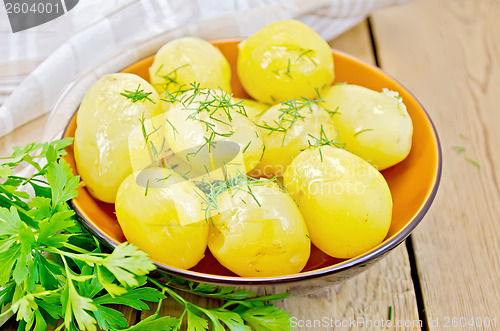 Image of Potato boiled with parsley on the board