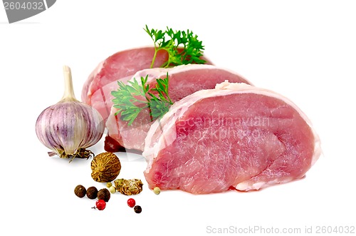 Image of Meat pork slices with spices and garlic