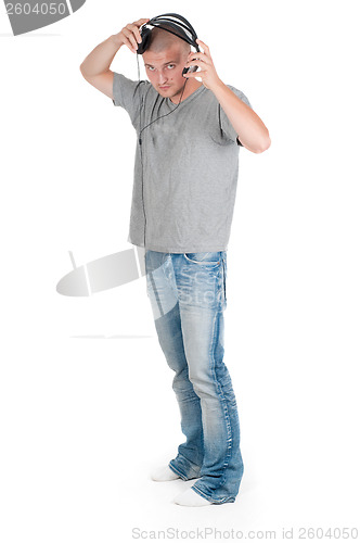 Image of Man in headphones watching on you