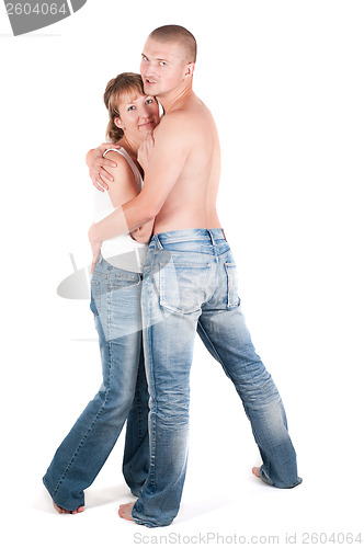 Image of Couple in studio taking to breast