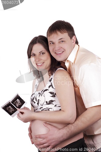 Image of Expectant parents with baby picture