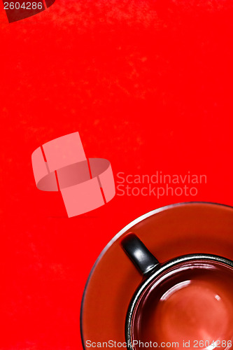 Image of empty cup on a red background